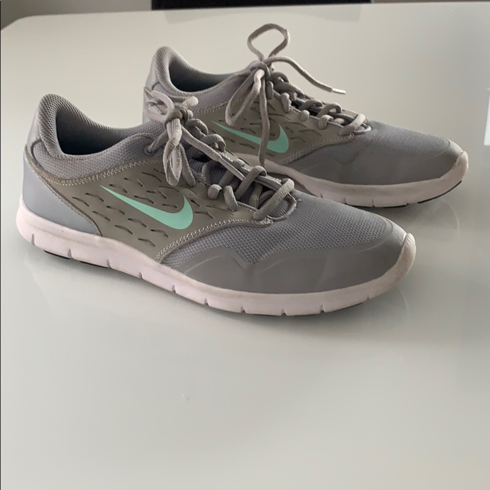 Nike light gray sneakers, turquoise swoosh
